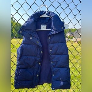 Old Navy puffer vest in navy color and size small.